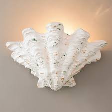 Only 8 left *the santa barbara collection was inspired by colonial mexico's mission churches and cathedrals. Scallop Shell Wall Sconce Shades Of Light