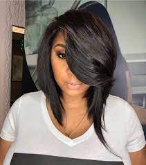 These black choppy layers, teased and combed to the front burst out into mahogany bangs for a chic hairstyle that doesn't need length or curls to be feminine and voguish. 60 Showiest Bob Haircuts For Black Women