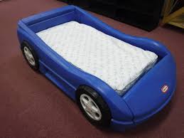 Car bed designs are a great way to surprise your kids so that they can have a totally different experience when they rest or sleep. Blue Little Tykes Race Car Bed With Mattress Toddler Bed Estore Auction Furniture Household Items 3 Load Out Days Everything Starts At 1 00 Equip Bid