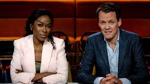 Une présentatrice à la robe très courte oublie qu'elle est assise derrière une table en verre. Giovanca Ostiana Is Derde Op1 Presentatrice Die Ziek Thuiszit Rtl Boulevard