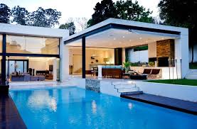 Apr 16, 2020 · read on for the best pool house design ideas that'll get your space ready for summer (or simply provide you with a mental vacation). Pool Patio Ideas Bring Modernity Luxury Flat Roof House Design Blue Pool Open Patio Pool House Designs Modern Patio Design Pool Houses