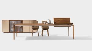 If they are on the very edge, you and your guests can sit next to each other without problem. Tak Extendable Table With Wood Leg For Wood Purists Team 7