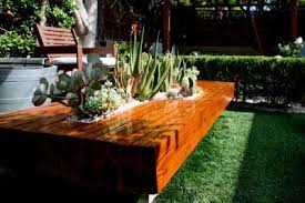 With the list of 32 fun and functional diy pallet and wood planter box ideas below, you can spice up your porch or yard in just a few hours. Planter Table With Herbs And Fruits Growing From Plant Pots In The Tabletop
