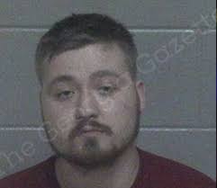 Former employee charged with battery after fight at business