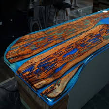 While it does offer some protection, the constant wind, sunlight, and exposure to moisture will dry out the oil that is near the surface over time. Fiberglass Table Top Epoxy