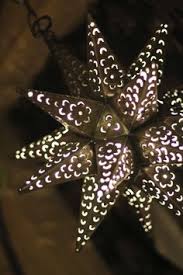 The marbles glow like jewels when the star is lit up. 22 Best Mexican Tin Star Lights Ideas Tin Star Lights Tin Star Lights