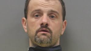 Man pleads guilty to distributing meth