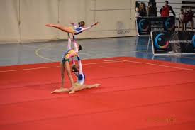 Acrobatic gymnastics is a competitive gymnastic discipline where partnerships of gymnasts work together and perform figures consisting of acrobatic moves, dance and tumbling, set to music. Gimnasia Acrobatica 1 Colegio Ntra Sra De La Consolacion