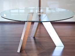 The brushed stainless steel softens the appearance of the striking angular shapes. Contemporary Coffee Table Pure Inox Glass Stainless Steel Round