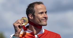 Paralympics: Marcel Hug wins marathon gold for the third time in a row