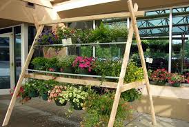 Floral Display Stand Google Search Garden Center Displays Plant Display Ideas Hanging Basket Stand