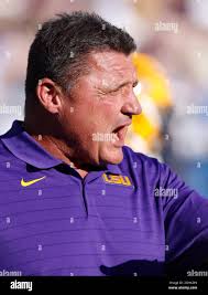LSU Tigers' head coach Charles McClendon is carried off the field by  members of his team after they defeated the University of Texas 13-0 in the  Cotton Bowl in Dallas, Jan. 1,