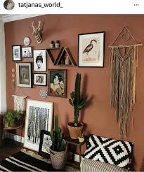 This Wall Is Asymmetrical Because The Pictures Are Staggered Not Set Up To Be Even Western Home Decor Home Decor Decor