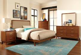 The hard lines mix with circles, curves, and swirls for a geometric experience that's pleasing to the eye. Mid Century Modern Bedroom Ideas To Enhance Your Bedroom