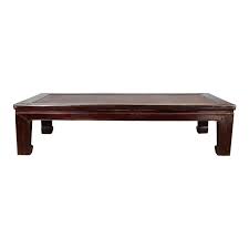 With influences from the east and west, this modern wooden coffee table has marquetry and painted top with a bronzed finish frame. Antique Chinese Wooden Coffee Table With Dark Patina And Woven Rattan Top For Sale At 1stdibs