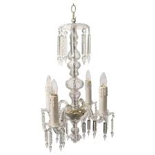 Our antique and vintage chandeliers collection includes glass, brass, bronze, crystal, metal wrought iron, cast iron and milk glass. 1940s Petite Antique Baccarat Bohemian 4 Light Clear Crystal Chandelier For Sale At 1stdibs