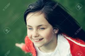 The color helps create a beautiful contrast with your cool blue eyes while also complementing your skin tone. Smiling Face Of Little Cute Happy Girl Child With Blue Eyes And Stock Photo Picture And Royalty Free Image Image 57489421