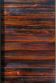 Charred Wood Siding The Japanese Shou Sugi Ban Method Blowtorch Charred Wood Wood Furniture Design Wood Siding