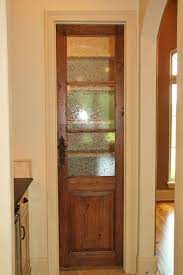 Why A Cool Pantry Door Is The Secret Ingredient To A Cool Kitchen Design Designed Kitchen Pantry Doors Home Doors Interior