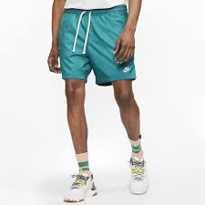 Nike Flow Woven Shorts Men S Turquoise White In 2020 Mens Shorts Outfits Mens Sportswear Nike Clothes Mens