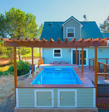 They should not be attached to the pool for stability the pool is essentially just adjacent to the deck. Pool Deck Ideas Above Ground Pool Decks Pool Deck