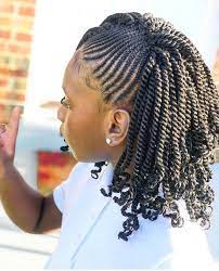 At the back, they come together in a low, big, messy bun. Pin By Taja Welch On Kids Hair Styles Kids Braided Hairstyles Natural Hair Braids Braided Hairstyles