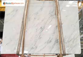 Floor and wall tile is a polished natural stone marble that illustrates classical romance. Calacatta Gold Marble Herringbone Pattern For Bathroom