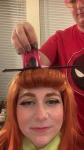 Roxolana Ridel dresses up as Daphne Blake in this cosplay photo taken by  Jay Wan Mei.