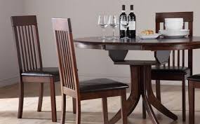 Marvellous round oak extendable dining table and chairs 11 with within most current round extendable dining tables and chairs view photo 19 of 20. Hudson Round Extending Dark Wood Dining Table And 4 Oxford Chairs Set Dark Wood Dining Table Dining Table Table