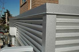 Premade corners that hide siding edges and a hinged column wrap highlight this trim package. Corrugated Aluminum Siding Networx