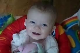 Mum's heartbreak after eight-month-old daughter dies beside her