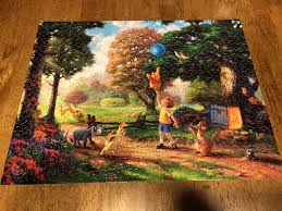 Pooh is sweet, lovable and most of all he loves honey! A 500 Piece Thomas Kinkade Winnie The Pooh Puzzle Much Easier Than The Previous Kinkade Puzzles This One Actually Had Bright Different Colors The Green Trees Took The Longest Time To Complete Jigsawpuzzles