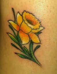I Would Like A Very Tiny Delicate Daffodil Tattoo To Represent W S Birth Month As A Celebration O Daffodil Tattoo Daffodil Flower Tattoos Birth Flower Tattoos