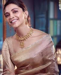 A gorgeous red, rust and gold saree for her wedding with ranveer singh on november 14, 2018. Deepika Padukone In Traditional Indian Saree Pics