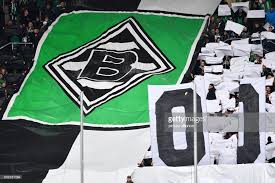 The source also offers png transparent logos free: Gladbach Fans Hold Up Abanner Featuring The Club Logo At The News Photo Getty Images