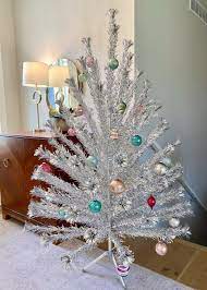 Christmas tree comes without toys !!! Aluminum Christmas Trees Are Yuletide Cool Antique Trader