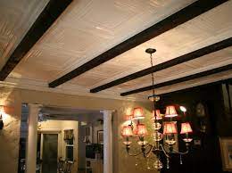 You will use lots and lots of paint, like get about 1/3 the coverage stated on the can. How To Installing Tin Ceiling Panels Hgtv