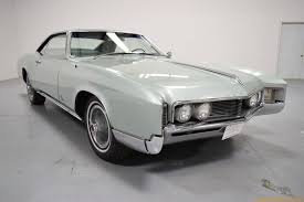 Image result for Riviera Champagne 1966 Buick