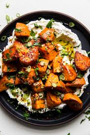 Oven Roasted Sweet Potatoes Recipe With Honey And The Modern Proper Recipe Roasted Sweet Potatoes Sweet Potato Side Dish Sweet Potato Recipes