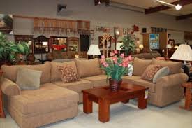 Pick a style that you like, such as contemporary living room furniture, and look for pieces within the same style grouping. Showroom Photos American Wholesalers Furniture Store