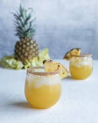 Here is the recipe for the christmas punch made with rum. Spiced Pineapple Rum Punch Recipe Pineapple And Coconut