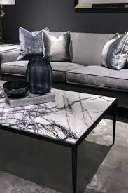 Hard, sculptural rock strikes a strong statement when unbroken—marble slab dining tables and cut marble accent tables look like functional sculptures in the living room and dining room. Small Coffee Table Design Ideas Coffee Table Design Above Is An Extremely Remarkable And Al Living Room Decor Gray Black Living Room Marble Tables Living Room