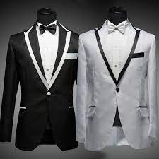 What to wear black tailcoat white bow tie wing tip tuxedo shirt button studs waistcoat (a sort of vest with lapels) black tuxedo pants black patent leather shoes. Black And White Men Suit Dress Yy