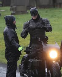 The suit includes a billowing cape and small, pointed ears. The Batman 2021 Set Photos Reveal New Batsuit And It Is Terrible