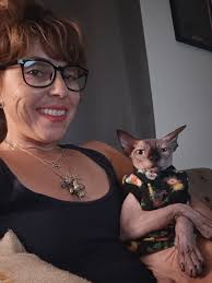 Sphynx cat Lola watching videos