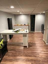 Trafficmaster Lakeshore Pecan 7 Mm Thick X 7 2 3 In Wide X 50 5 8 In Length Laminate Flooring 24 17 Sq Ft Attic Remodel Attic Renovation Attic Flooring