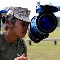 CPT Jack C. Cuddy, right, and Warrant Officer Neil Goddard, left brief GEN  Robert H. Barrow, commandant of the Marine Corps, center,