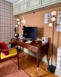 A before-and-after of our home office from a different angle (swipe for the  before)! This was a room we added to our semi-finished basement when we  moved in by adding a wall,