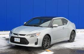 Open and unlock the driver's side door. Car Review 2014 Scion Tc Driving