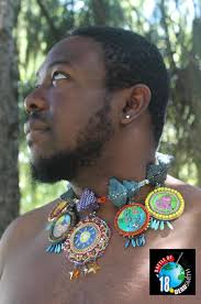 Liza Lou's Kitchen (1991–96) is a life-sized installation entirely covered  in glass beads, turning an ordinary kitchen into a dazzling,  labor-intensive work of art. Created over five years, the piece challenges  traditional